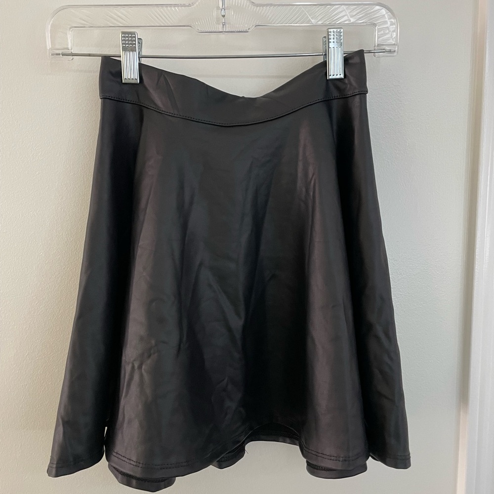 black faux leather mini skirt